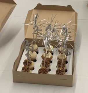 Picture of cupcakes with decorations of the number 25