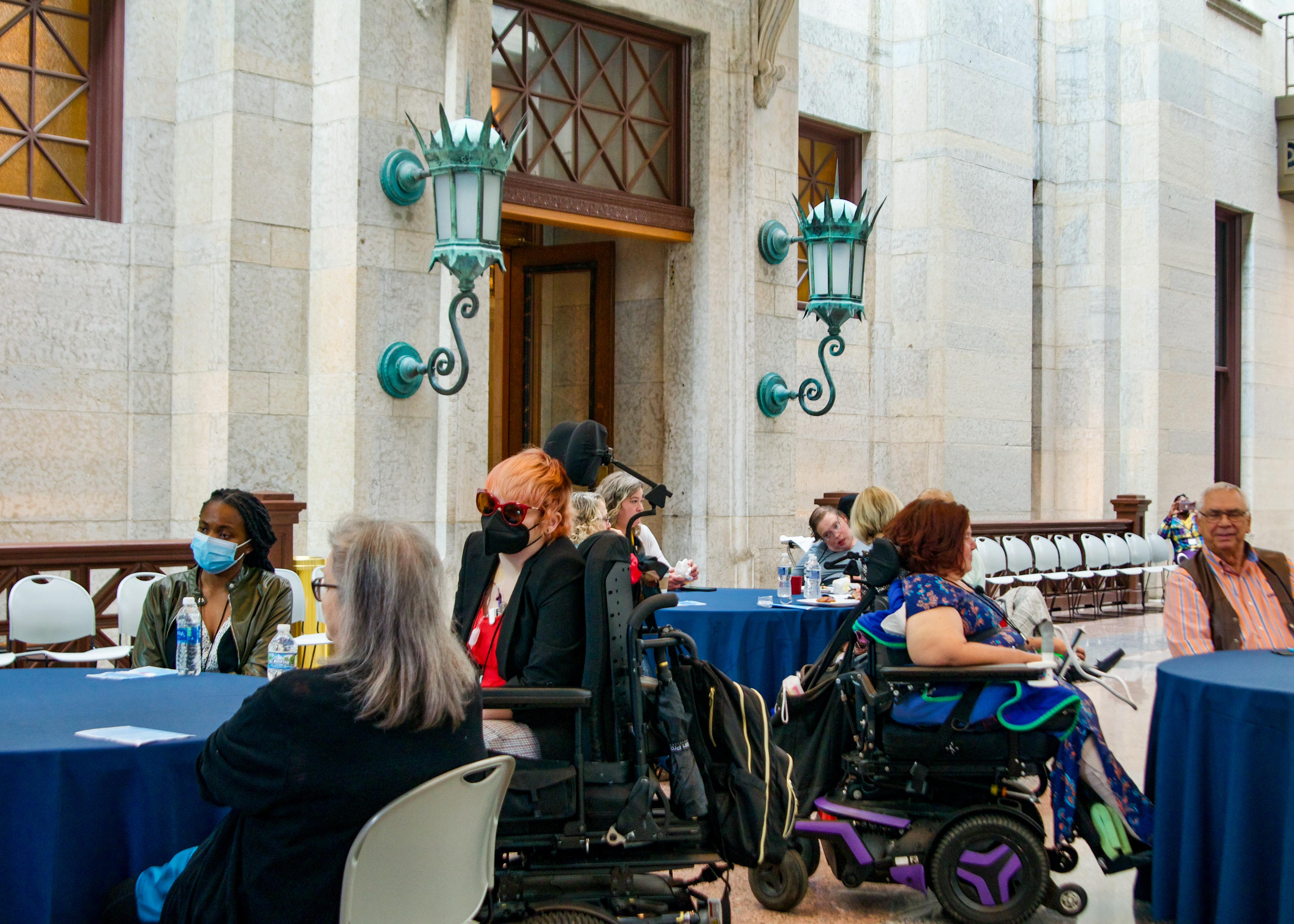 OOTF Advocates sit at several round tables at the Celebrate Our Carers Event inside the Ohio Statehouse